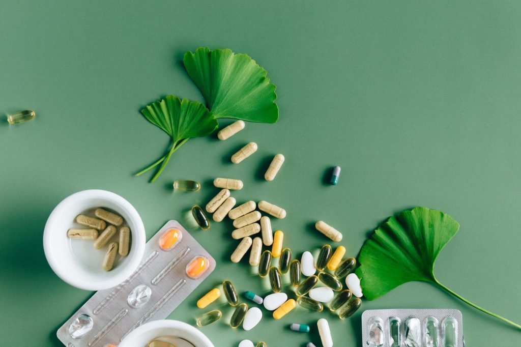 flat lay photo of alternative medicines